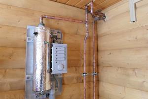 Electric boiler for heating a private home: tips for choosing